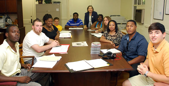 Fighting Okra Records staff, from left to right, Roy Phillips from Greenville, Reed Jones from Cleveland, Danitra West from Cleveland, Chris Sparks from Southaven, Jason Lane from  Forrest City, Ark., Tricia Walker (faculty advisor), Christina Knight from Hollandale, Jay Griffing from Vicksburg, Tara Rowe from Lake Village, Ark., Jarvis Farmer from Cleveland, and Lance Vaughn from Olive Branch.